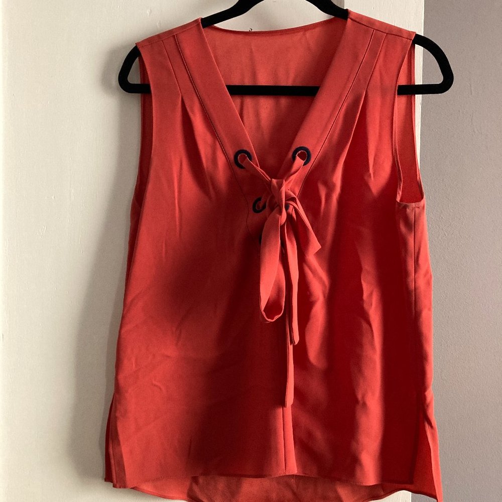 Coral sleeveless blouse